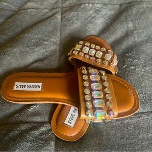 Tan sandals with embellishments